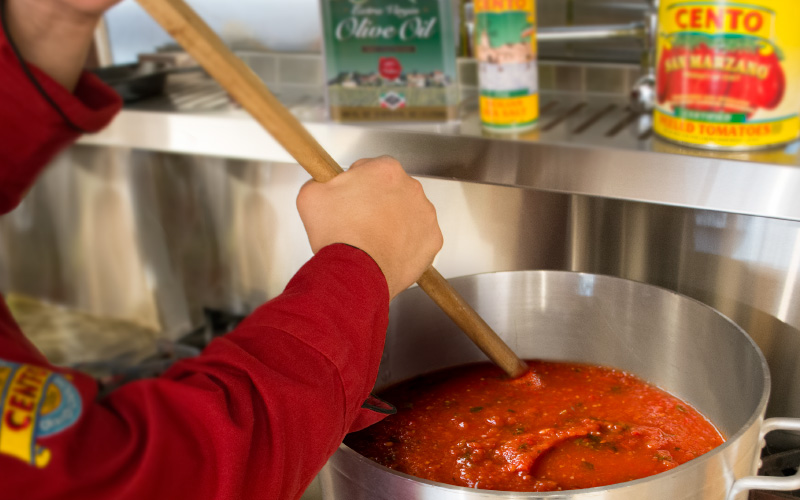 Chef stirring pot